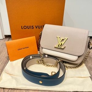Louis Vuttion lockme tender bag with strap AUTHENTIC